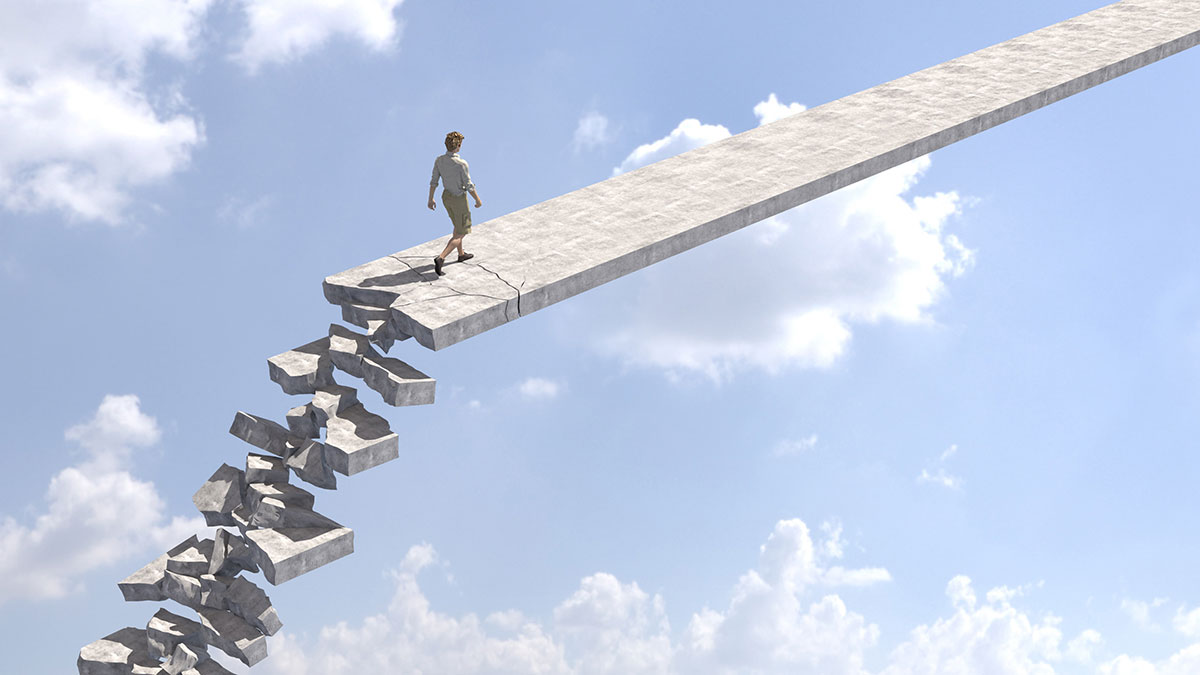 business woman taking risk walking on broken road